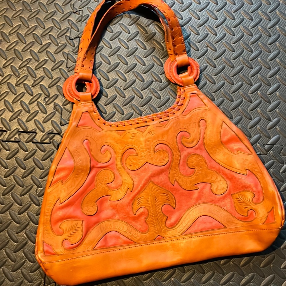 Orange leather purse with beautiful detail